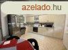 Csaldi hz zlethelyisggel kln lakrsszel 