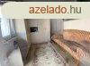 Csaldi hz zlethelyisggel kln lakrsszel 